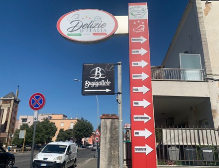 Insegna Delizie d'Italia Ingresso Negozio